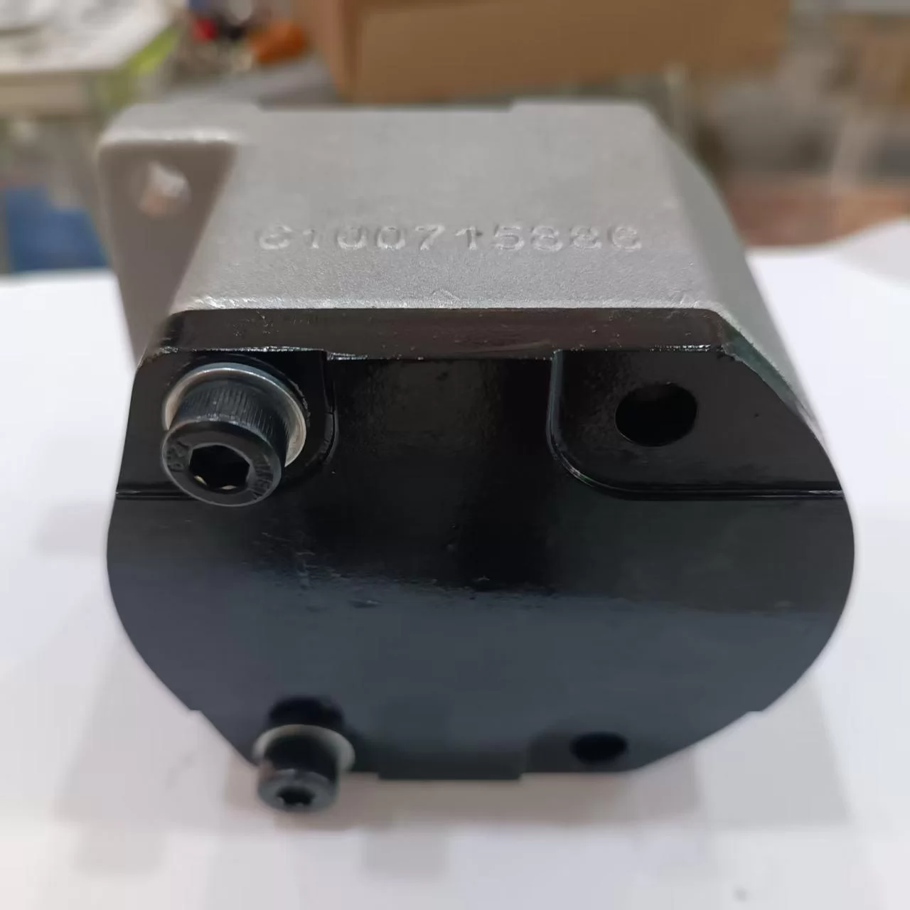 Close-up of A8VO80 double piston pump mounting flange, shaft end and port connections
